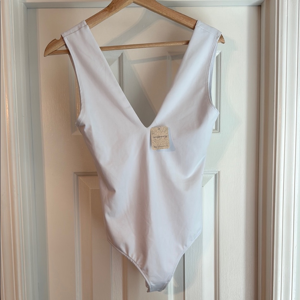 NWT Free People White Bodysuit with Plunging V-Neckline